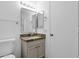 Bright bathroom features granite countertops, modern sink, and a decorative mirror at 1320 E Binner Dr, Chandler, AZ 85225