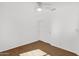 Bright bedroom features wood floors, a ceiling fan, and a closet with sliding doors at 1320 E Binner Dr, Chandler, AZ 85225