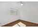 Bedroom featuring a ceiling fan, natural light, and wood-look flooring at 1320 E Binner Dr, Chandler, AZ 85225