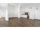 Bright, open-concept living room with tile floors and modern ceiling fan and stylish modern light fixture at 1320 E Binner Dr, Chandler, AZ 85225
