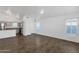 Open-concept living room featuring tile flooring, and light colored cabinets, with natural light from windows at 1320 E Binner Dr, Chandler, AZ 85225