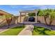 Outdoor grill area with a pergola and landscaped with palm trees at 1320 E Binner Dr, Chandler, AZ 85225