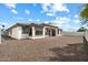 An appealing view of the backyard of this bright and welcoming home, featuring a neutral color scheme at 14112 N 12Th St, Phoenix, AZ 85022