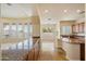Open living area featuring granite countertops, an adjoining living area, and large windows with a view at 14112 N 12Th St, Phoenix, AZ 85022