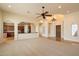 Bright and open floor plan with views of the kitchen, fireplace, and decorative lighting at 14112 N 12Th St, Phoenix, AZ 85022