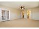An open main bedroom with an ensuite bathroom and french door access to the patio at 14112 N 12Th St, Phoenix, AZ 85022