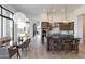 Open kitchen and dining area with a center island, pendant lighting, and stainless steel appliances at 15332 E Hidden Springs Trl, Fountain Hills, AZ 85268