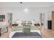 Spacious main bedroom with a large bed, bench, and ample lighting, offering a relaxing retreat at 15332 E Hidden Springs Trl, Fountain Hills, AZ 85268