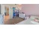 Bedroom featuring walk-in closet, dresser, and platform bed at 162 W El Freda Rd, Tempe, AZ 85284