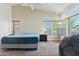 Bedroom with vaulted ceiling, windows, blinds, carpet and furnishings at 162 W El Freda Rd, Tempe, AZ 85284