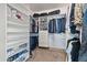 Organized walk-in closet with shelving and hanging racks for ample storage at 162 W El Freda Rd, Tempe, AZ 85284
