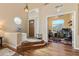 Inviting foyer featuring hardwood floors, high ceilings, and an arched doorway to a sunny office at 162 W El Freda Rd, Tempe, AZ 85284