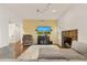 Cozy living room with a stone fireplace, television, and plush seating for relaxation at 162 W El Freda Rd, Tempe, AZ 85284