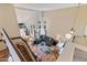 Living room featuring high ceilings, large windows, and a gray sectional sofa at 162 W El Freda Rd, Tempe, AZ 85284