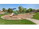 Well-maintained community playground featuring modern play equipment and a mulch safety surface at 162 W El Freda Rd, Tempe, AZ 85284