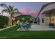 Gorgeous backyard with patio, manicured lawn, and inviting pool area for ultimate outdoor enjoyment at 18001 N 44Th Way, Phoenix, AZ 85032