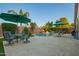 Outdoor area with swimming pool, dining table, and lounge chairs at 18001 N 44Th Way, Phoenix, AZ 85032