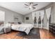 Bedroom featuring vaulted ceiling, ceiling fan, and natural light at 18001 N 44Th Way, Phoenix, AZ 85032