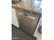 Modern stainless steel Bosch dishwasher, seamlessly integrated into the kitchen cabinetry, with easy-to-use controls at 18001 N 44Th Way, Phoenix, AZ 85032