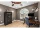 This office offers travertine flooring, a built-in desk, and a Winchester safe at 18001 N 44Th Way, Phoenix, AZ 85032