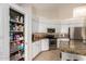 Spacious kitchen featuring pantry, stainless appliances, and granite counters at 18001 N 44Th Way, Phoenix, AZ 85032