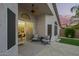 Covered outdoor patio features comfortable seating and elegant design, enhancing outdoor living at 18001 N 44Th Way, Phoenix, AZ 85032