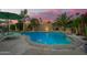 Beautiful backyard pool surrounded by lush landscaping, perfect for relaxation and entertainment at 18001 N 44Th Way, Phoenix, AZ 85032