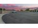 View of the property's surroundings, including a quiet street and well-maintained landscaping at 18001 N 44Th Way, Phoenix, AZ 85032