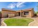 Charming backyard with well-maintained landscaping and covered patio area, perfect for outdoor relaxation and entertainment at 1843 S Sunnyvale Ave, Gilbert, AZ 85295