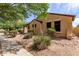 Charming home exterior featuring low maintenance desert landscaping and sidewalk at 1843 S Sunnyvale Ave, Gilbert, AZ 85295