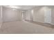 Large open-concept living room with neutral tones and ample space at 1843 S Sunnyvale Ave, Gilbert, AZ 85295