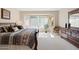 Comfortable bedroom with a large bay window and ample natural light at 19005 N Diamante Dr, Surprise, AZ 85387