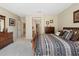 Spacious bedroom featuring a comfortable bed, dresser, and serene atmosphere at 19005 N Diamante Dr, Surprise, AZ 85387