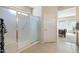 Bathroom features a shower and access to the bedroom at 19005 N Diamante Dr, Surprise, AZ 85387