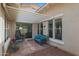 The house has a patio with comfortable seating, a shade covering, and brick pavers at 20627 W Grandview Dr, Buckeye, AZ 85396