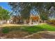 Large backyard with covered patio and seating, perfect for outdoor entertaining at 20627 W Grandview Dr, Buckeye, AZ 85396
