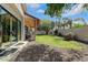 Expansive backyard with covered patio, mature trees and views of the desert at 20627 W Grandview Dr, Buckeye, AZ 85396