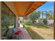 The home has an inviting backyard featuring a covered patio and green lawn at 20627 W Grandview Dr, Buckeye, AZ 85396