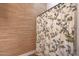 Charming bathroom with bird-themed shower curtain and textured wallpaper at 20627 W Grandview Dr, Buckeye, AZ 85396