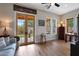 Comfortable den area with French doors leading to the backyard and plenty of natural light at 20627 W Grandview Dr, Buckeye, AZ 85396