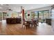 Elegant dining room with large windows, stylish furniture, and ample space, perfect for gatherings and meals at 20627 W Grandview Dr, Buckeye, AZ 85396