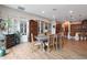 Open dining area with hardwood floors, comfortable seating, and natural light, ideal for everyday meals and special occasions at 20627 W Grandview Dr, Buckeye, AZ 85396