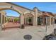 Shopping area with stone accents, shaded walkways, and a variety of retail and restaurant spaces at 20627 W Grandview Dr, Buckeye, AZ 85396