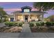 Charming single-Gathering home featuring a welcoming front porch, landscaped yard, and an inviting entrance at 20627 W Grandview Dr, Buckeye, AZ 85396