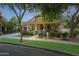 Charming single Gathering home featuring inviting front porch and beautiful desert landscaping at 20627 W Grandview Dr, Buckeye, AZ 85396