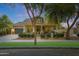 Charming single Gathering home featuring inviting front porch and beautiful desert landscaping at 20627 W Grandview Dr, Buckeye, AZ 85396