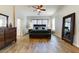 Large main bedroom with natural light, dark furniture, and neutral wall color at 20627 W Grandview Dr, Buckeye, AZ 85396