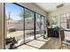 Bright room featuring sliding glass doors with a view of the well-maintained backyard and patio at 20627 W Grandview Dr, Buckeye, AZ 85396