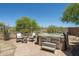 Inviting hot tub area with patio seating perfect for relaxing and enjoying the desert landscape at 23014 N 52Nd St, Phoenix, AZ 85054