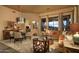 Inviting living and dining area with comfortable seating, stylish decor, and plenty of natural light at 23014 N 52Nd St, Phoenix, AZ 85054
